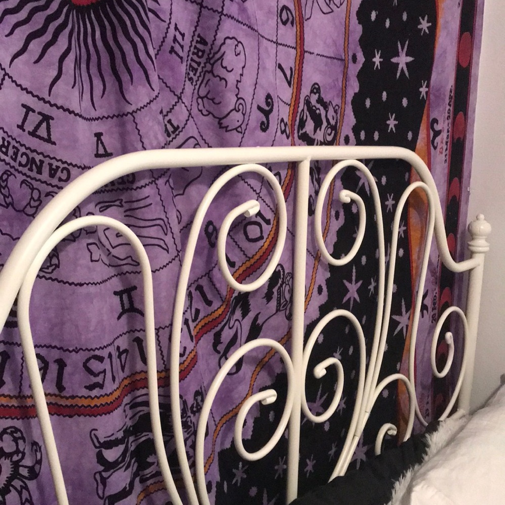 Full sized white metal bed frame